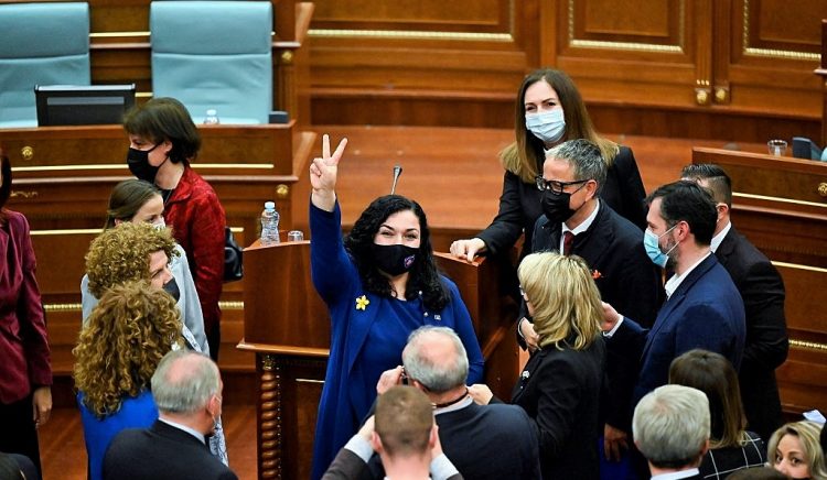 Newly elected President of Kosovo Vjosa Osmani reacts after being sworn-in during a parliament session in Pristina on April 4, 2021. - MPs elected Kosovo's most popular politician Vjosa Osmani as president on April 4, 2021, overcoming an opposition boycott that had kept parliament short of a quorum one day earlier. Osmani, 38-years-old, is a law professor who belongs to a new political generation in the Balkan territory vowing to eradicate widespread corruption. (Photo by Armend NIMANI / AFP)
