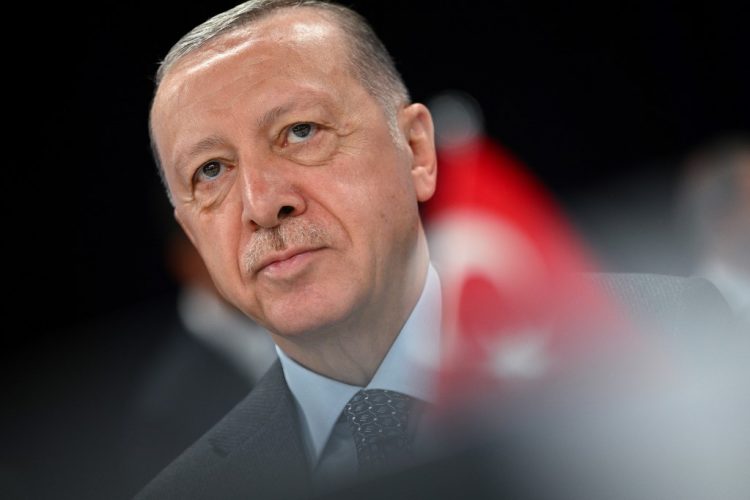 Turkey's President Recep Tayyip Erdogan looks on ahead of a meeting of The North Atlantic Council during the NATO summit at the Ifema congress centre in Madrid, on June 30, 2022. (Photo by GABRIEL BOUYS / AFP)