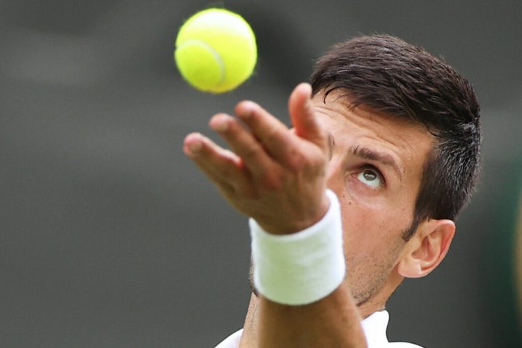 (220628) -- LONDON, June 28, 2022 (Xinhua) -- Novak Djokovic serves during the mens singles first round match between Novak Djokovic of Serbia and Kwon Soonwoo of South Korea at Wimbledon Tennis Championship in London, Britain, on June 27, 2022. (Xinhua/Li Ying)