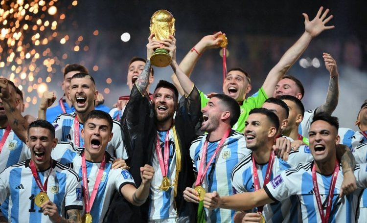 Argentina's forward #10 Lionel Messi lifts the World Cup trophy during the Qatar 2022 World Cup trophy ceremony after the football final match between Argentina and France at Lusail Stadium in Lusail, north of Doha on December 18, 2022. - Argentina won in the penalty shoot-out. (Photo by FRANCK FIFE / AFP)