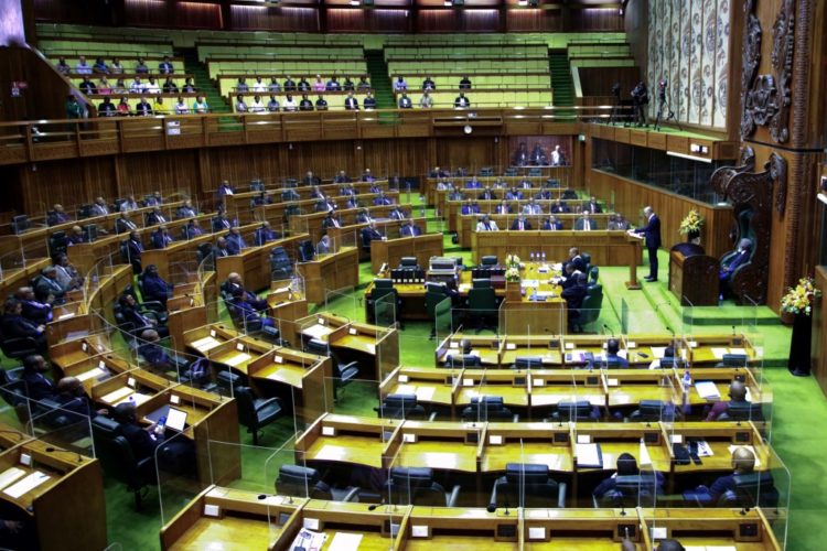 Australia's Prime Minister Anthony Albanese (2nd R, standing) addresses the Papua New Guinea Parliament in Port Moresby on January 12, 2023. - Albanese called for a "swift" new security deal with Papua New Guinea, as his government seeks to parry China's expanding influence in the Pacific. (Photo by ANDREW KUTAN / AFP)